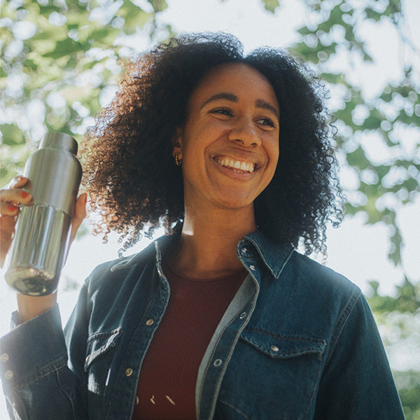 bring-your-own-party-kit-tumblers-and-cocktails-n8 16oz_rise_reflect_woman_smile_square.jpg
