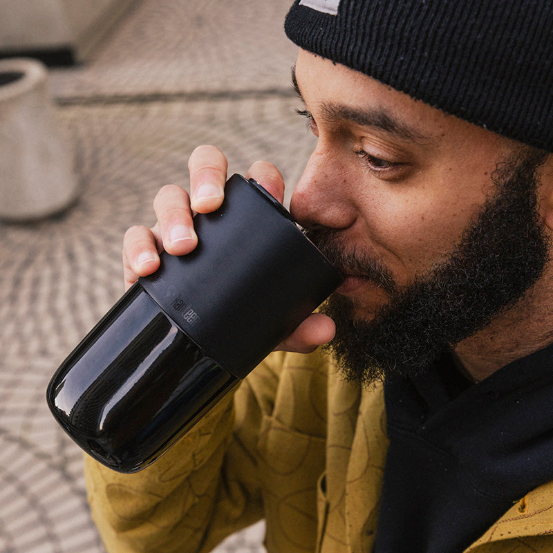 16oz-rise-tumbler-k0 16oz_rise_tumbler_black_man_drink_square.jpg