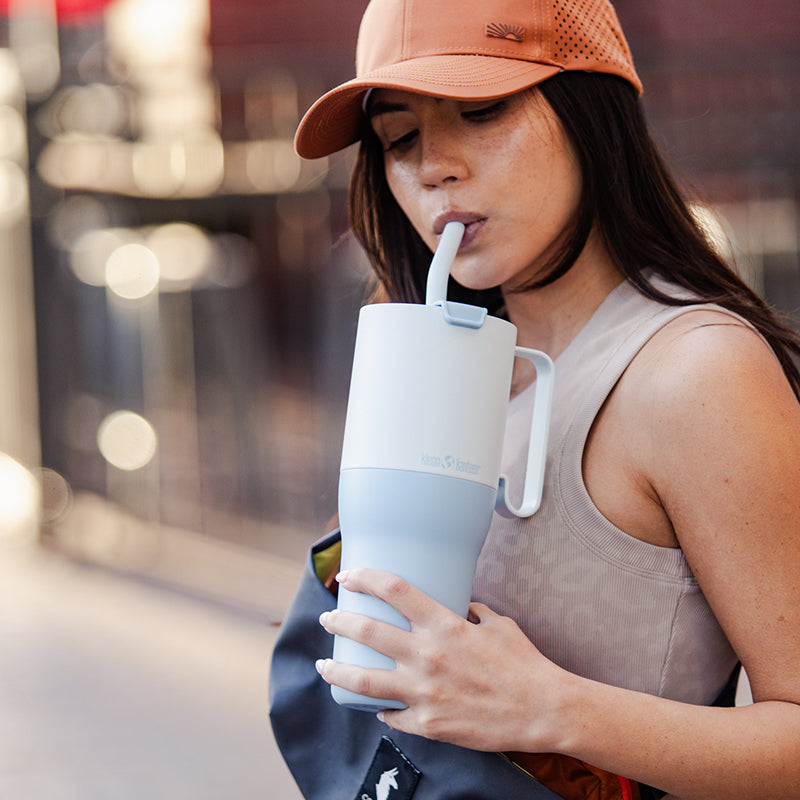 36oz-rise-tumbler-with-straw-lid-h8 36oz_rise_tumbler_straw_girl_sip_square.jpg