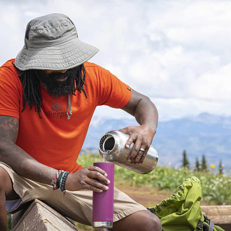 64oz-tkwide-with-loop-cap-m1 tkwide_64oz_bottle_backpacker_mountains_filling_square.jpg