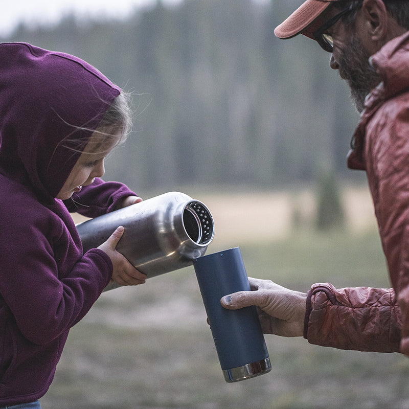 64oz-tkwide-with-loop-cap-m1 tkwide_64oz_bottle_girl_dad_filling_square.jpg